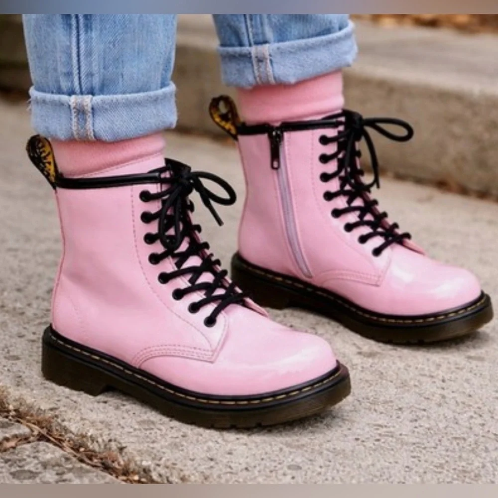 Dr. Martens Junior 1460 Patent Leather Lace Up Girls’ Boots in Pale Pink.